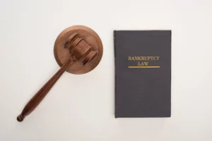 Gavel next to “Bankruptcy Law” book symbolizes legal process for handling tax debts in Chapter 13.